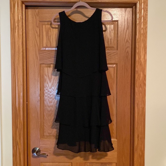 Fun, black sleeveless dress that twirls - Picture 2 of 6